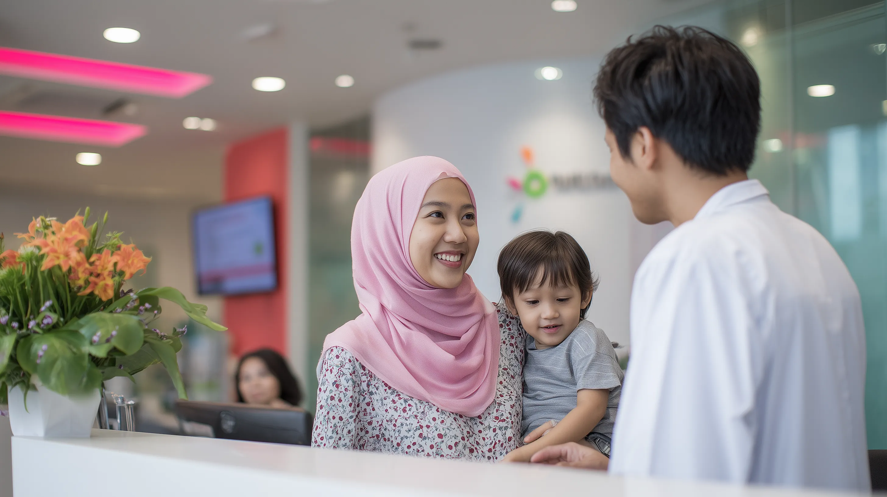 _family_at_modern_clinic_reception_mother