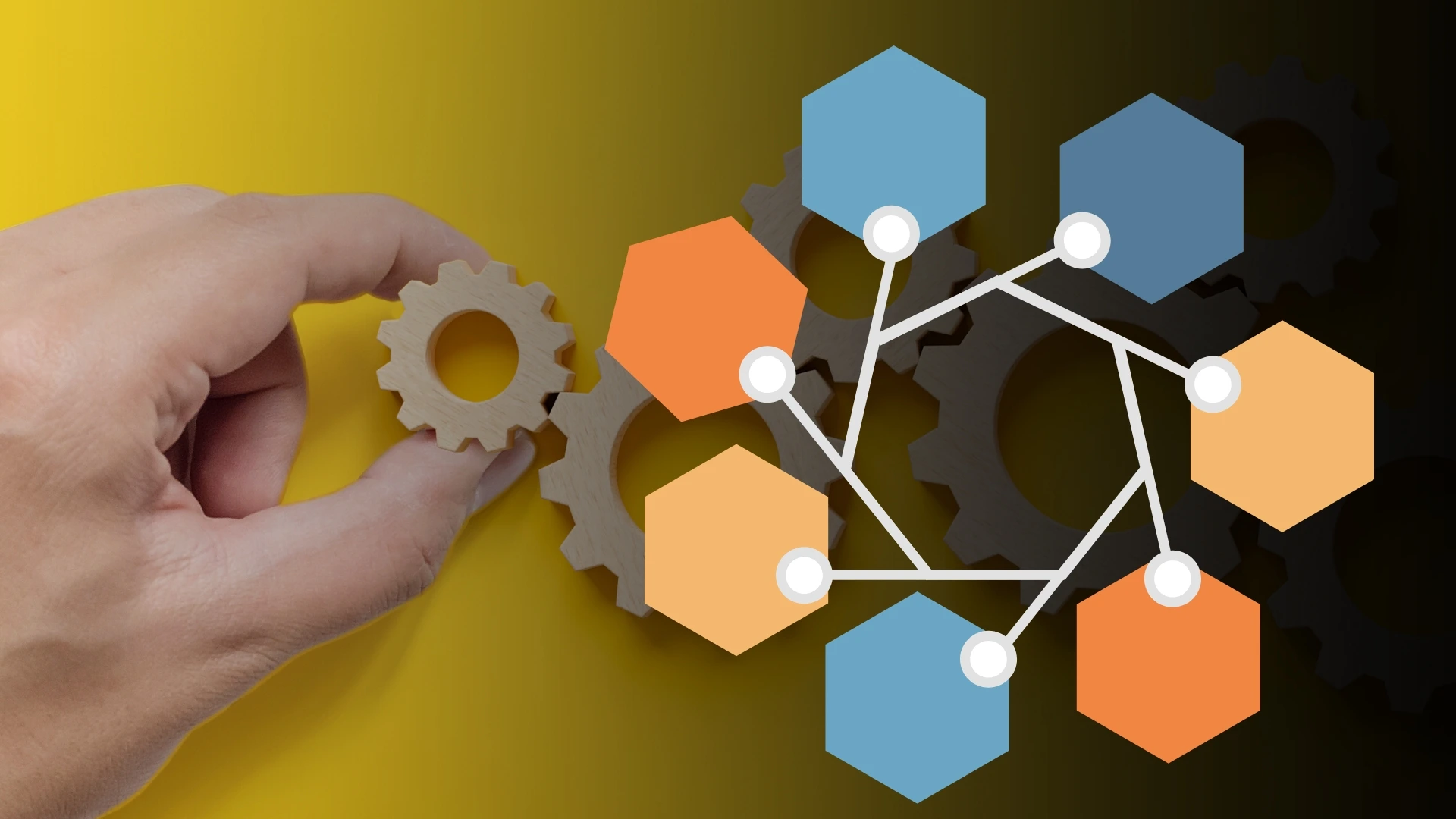 A hand placing a gear into a connected network of hexagonal nodes